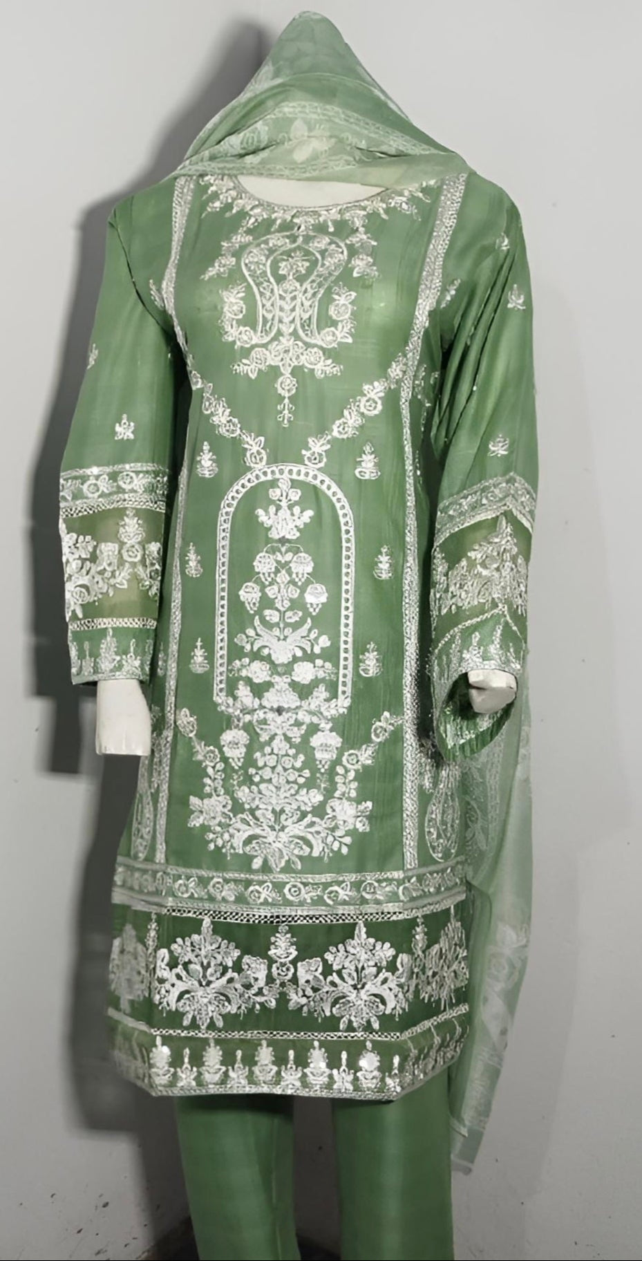 "Pastel green 3-piece cotton suit with intricate white thread embroidery, plain trouser, and floral printed dupatta – elegant semi-formal outfit"